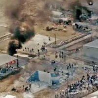 Uprising at Private Prison Leads to Transfer of Thousands of Prisoners