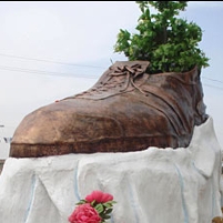 Bush Shoe Sculpture Gets the Boot