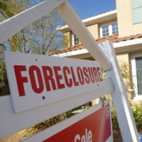 Canadian Bank Threatens to Foreclose on U.S. Homeowners to Collect Credit Card Debt