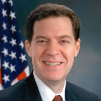 Kansas Gov. Brownback Sued for Signing Law Criminalizing the Enforcement of Federal Gun Laws