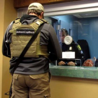 Georgians Sue for Right to Carry Guns into Police Stations