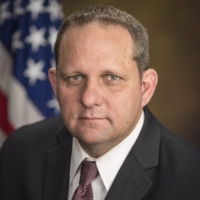 Acting Director of the U.S. National Central Bureau of INTERPOL: Who is Wayne Salzgaber?