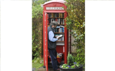 Phone Booth Turned into Library                                                                     